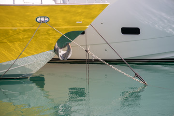 moored yellow yacht