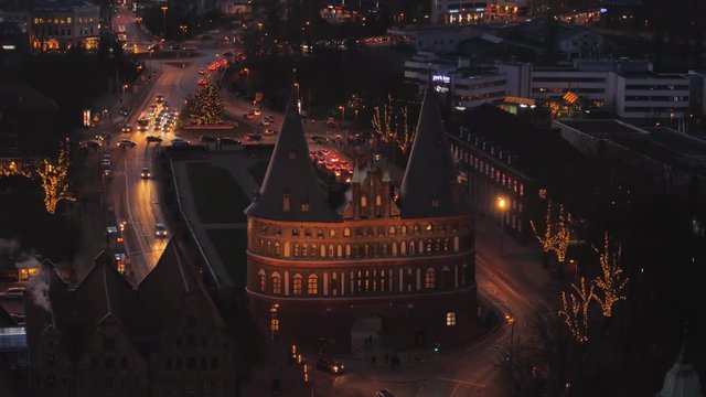 Historical Holstentor City Gate view at night. Lubeck.