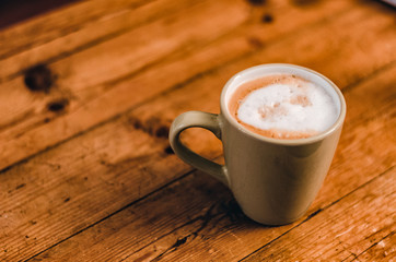 Cup of Cappuccino in a Cold Day