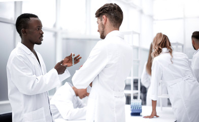 Group of chemistry students working in laboratory