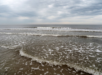 Sankt Peter-Ording - Pfahlbauten, Salzwiesen, Strandkörbe und Strand an der Nordseeküste am Nationalpark Wattenmeer
