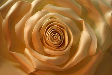 Light artificial bud of a rose./White petals of an artificial rose at natural lighting got cream tones. - obrazy, fototapety, plakaty