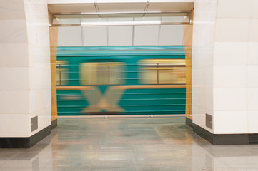 Moving train at subway station