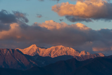 Julian Alps and Prealps in Italy at sunset, with Kanin Mountains