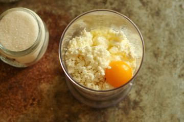 cupcakes cake from cottage cheese or cheese cakes (dough in the form). Top view