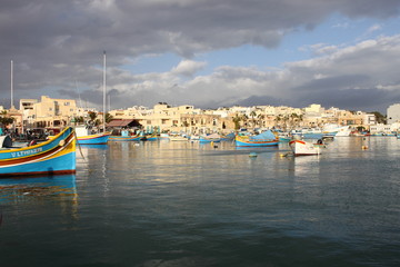 Traditional maltese fishing boat in Marsaxlokk, Malta