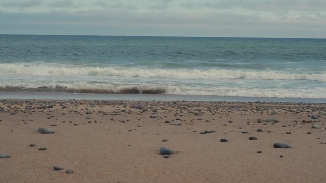 RL DOLLY view of a shore of Atlantic Ocean at sunset. 4K UHD