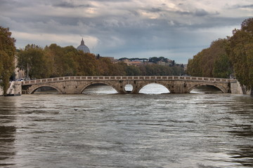 Fototapeta na wymiar Sisto bridge during the flood of the river Tevere. Rome, Italy