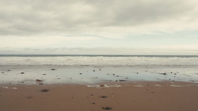 RL DOLLY view of a shore of Atlantic Ocean at sunset. 4K UHD