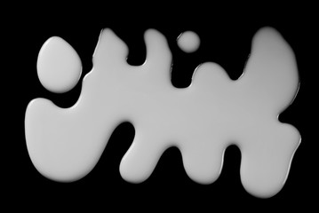 Spilled milk puddle isolated on black background and texture with clipping path, top view