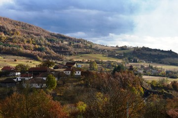 Fototapeta na wymiar autumn landscape of the village 