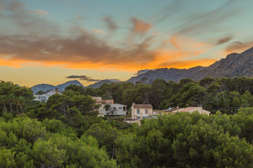 Fototapeta na wymiar Afterglow over Cala San Vicenc on Mallorca island