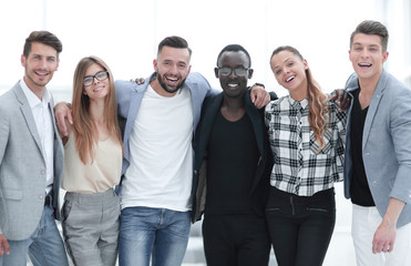 Fototapeta premium Casual group of people standing isolated over white background