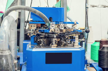 Knitting machine for making socks. Threads, parts, production of clothing.