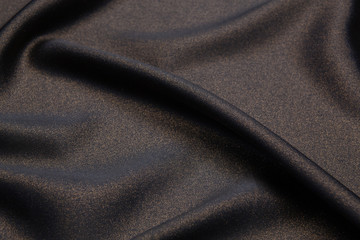 black and gold textile background