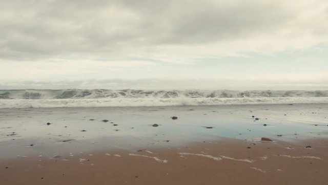 RL DOLLY view of a shore of Atlantic Ocean at sunset. 4K UHD