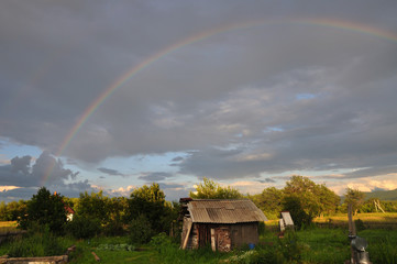 A beautiful full rainbow in the old village