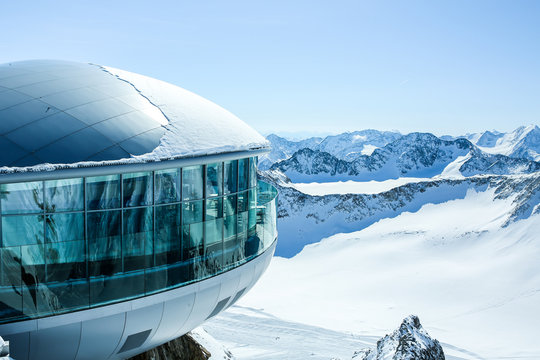 Cafe 3440 on the Pitztal Glacier. Austrias highest coffee house at mountain peak in Tirol, Pitztal Glacier and panoramic view of snow covered mountain range