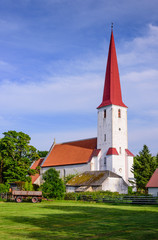 Fototapeta na wymiar Sightseeing of Saaremaa island. Medieval Lutheran church of St. Michael in the village of Kihelkonna, Saaremaa island, Estonia