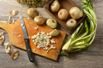 cut the onions on the cutting board