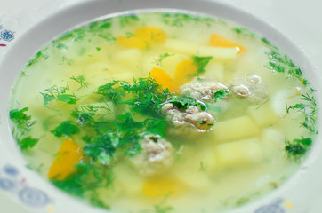 Homemade potato soup with greens. Healthy food.