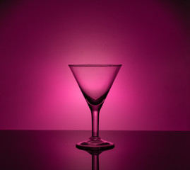 Martini glass on the background of neon lights
