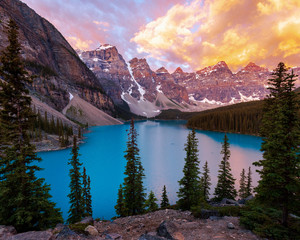 Vibrant Sunrise over the Mountains around Moraine Glacial Lake