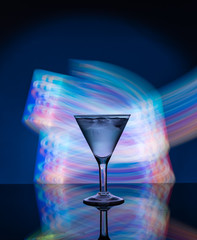 Martini glass on the background of neon lights