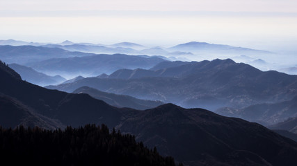 Dark view from Sequoia National Park with mountain scenery in dark blue with different shades, CA, USA