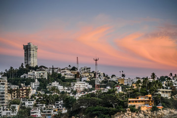 Acapulco Mexico Pacific Ocean View of the coastal line at Caleta  and clouds at the sunset