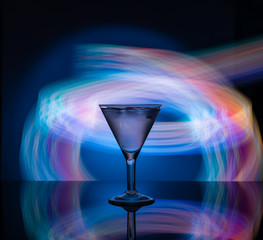 Martini glass on the background of neon lights