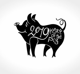 Template for the year of the pig 2019. Black silhouette of a pig and calligraphic inscription. New Year on the Chinese calendar.