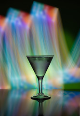 Martini glass on the background of neon lights