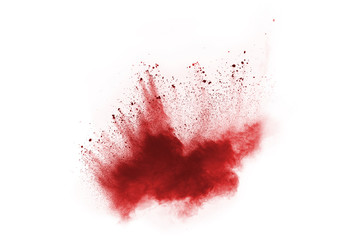 Red powder explosion on white background.