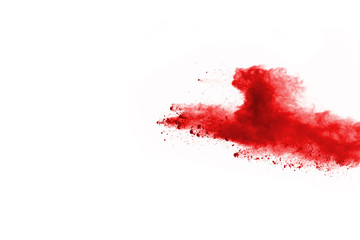 Red powder explosion on white background.
