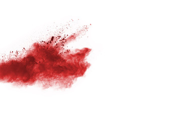 Red powder explosion on white background.