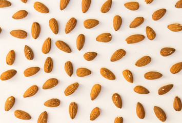 Background of almonds in white background