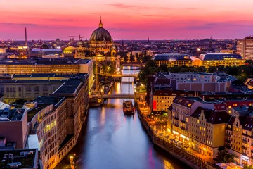 Tuinposter Aerial Berlin skyline panorama with TV tower and Spree river at sunset, Germany © Subodh