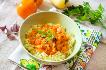 Steamed rice with stewed vegetables and turmeric