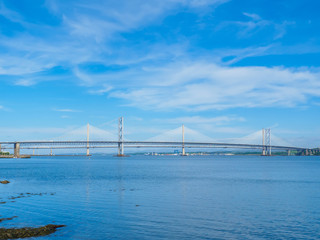 View of the Queensferry Crossing bridges over the Firth of Forth, Edinburgh, Scotland, UK.