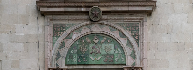 A soviet type of decor on a architectural construction
