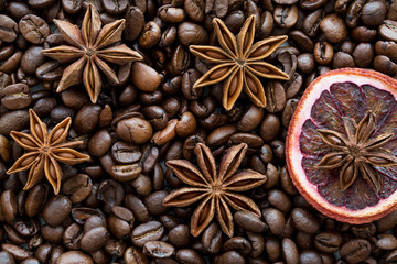 Dried sicilian orange slice and coffee beans, macro.
