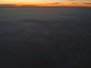 Fototapeta na wymiar Dawn above clouds
