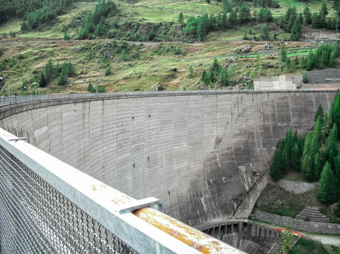 Beauregard Dam, a gravity arc construction, before the partial demolition which reduced the dam from 72 meters height to 20 meters height - Valgrisenche Village, Aosta Valley Province, Italy