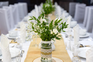 Wedding decor table setting and flowers.