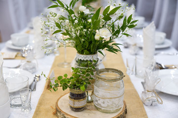 Wedding decor table setting and flowers.