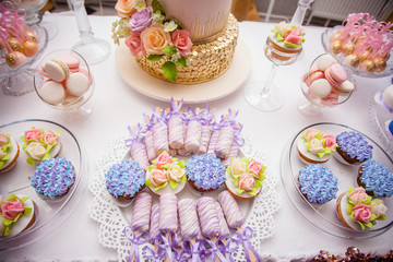 Wedding candy bar table. Cakes and other sweets