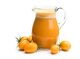 Fresh tomato juice made from the golden-yellow tomatoes in jar isolated