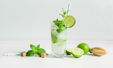Non-alcoholic cocktail mojito with ingredients for its preparation