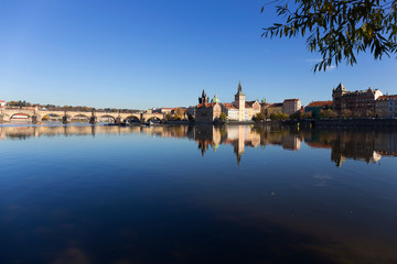 Fototapeta premium Colorful autumn Prague Old Town above River Vltava, Czech Republic